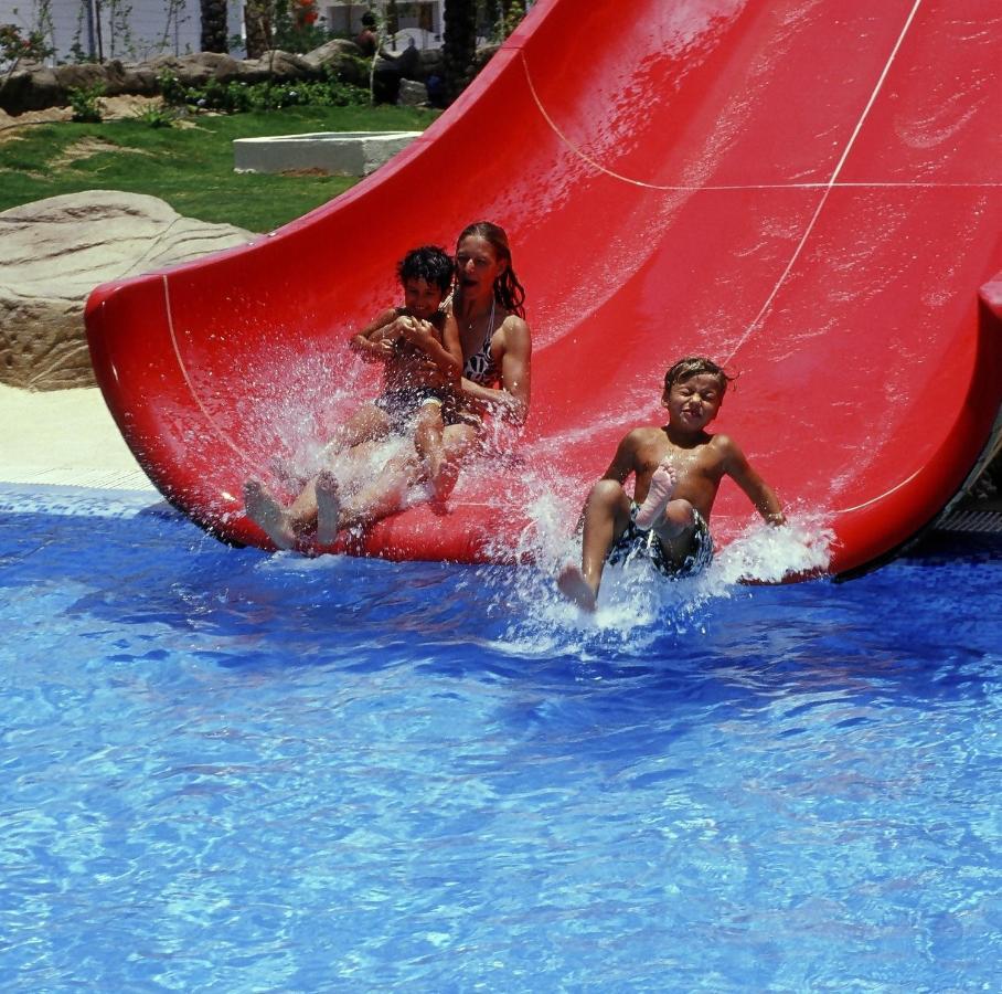 Sharm Dreams Vacation Club - Aqua Park Hotel ภายนอก รูปภาพ A water slide