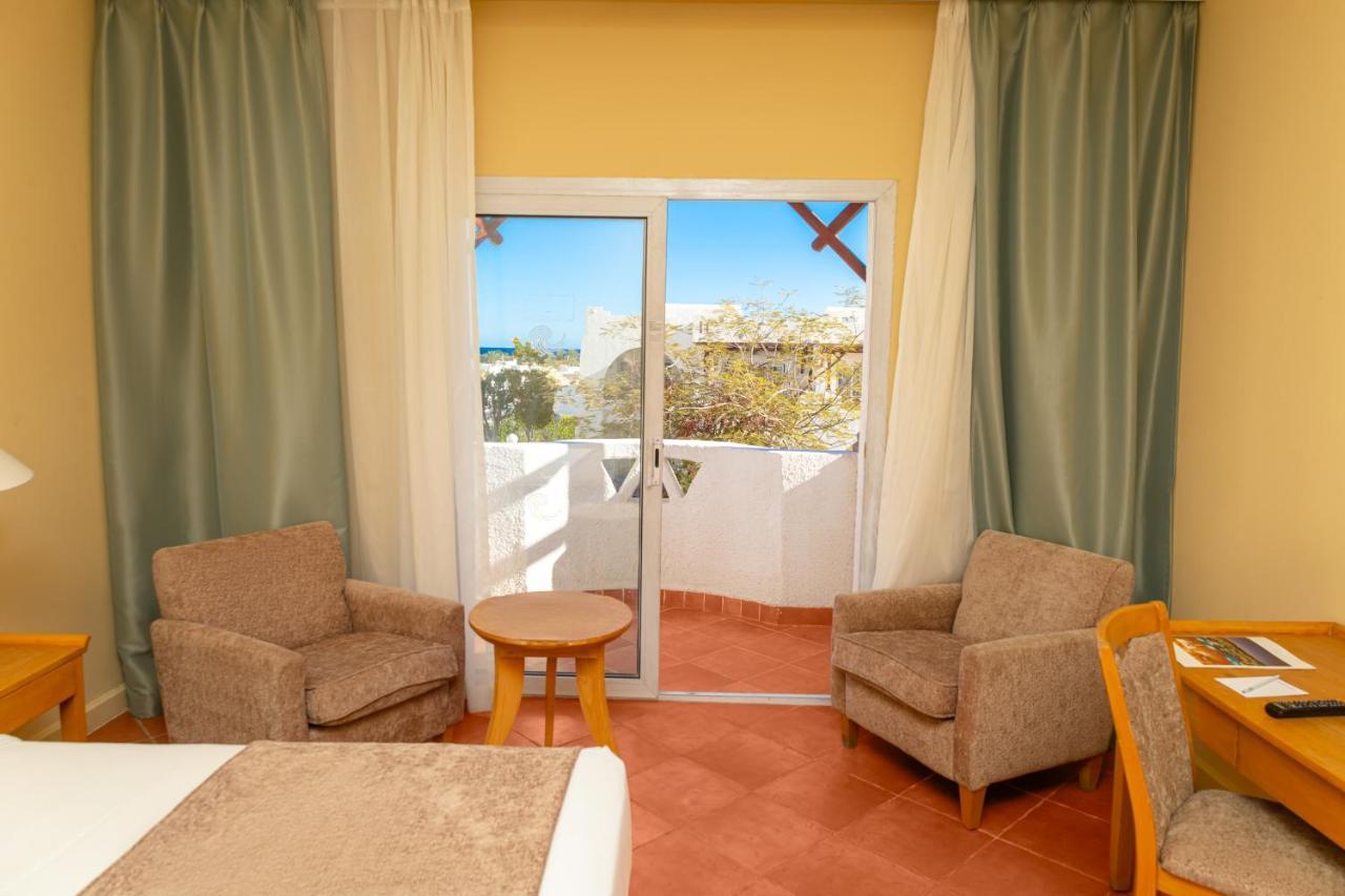 Sharm Dreams Vacation Club - Aqua Park Hotel ภายนอก รูปภาพ A room at the hotel