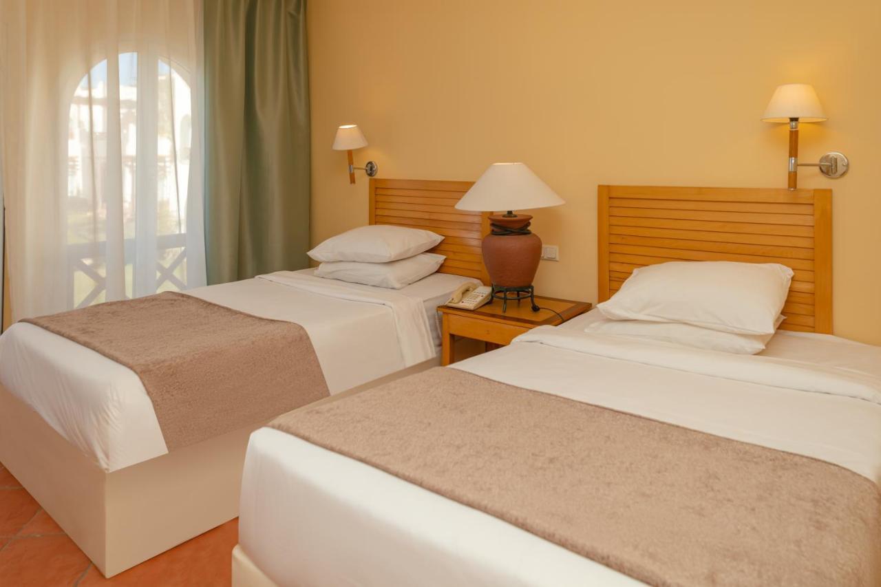 Sharm Dreams Vacation Club - Aqua Park Hotel ภายนอก รูปภาพ A bedroom