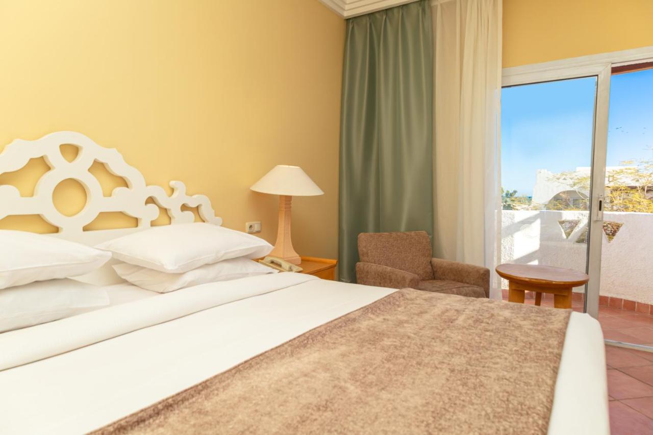 Sharm Dreams Vacation Club - Aqua Park Hotel ภายนอก รูปภาพ A bedroom at the hotel